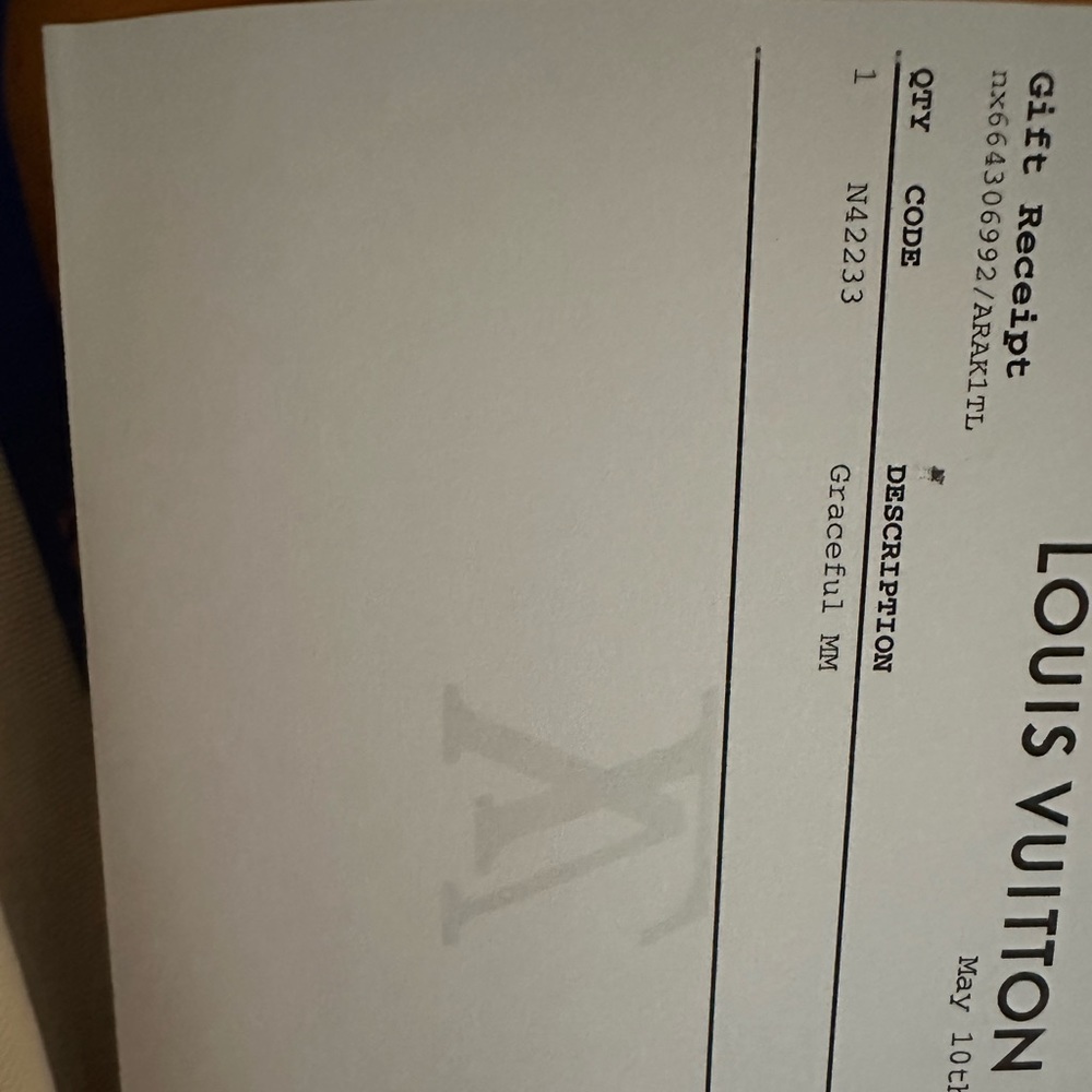 Brand new still in the box Louis Vuitton Graceful MM bag with dust bag etc.